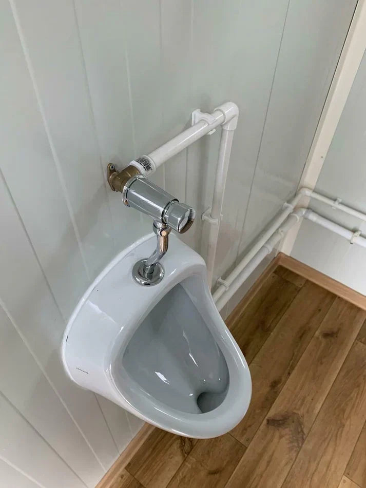 Contenedor sanitario doble con depósito de residuos.